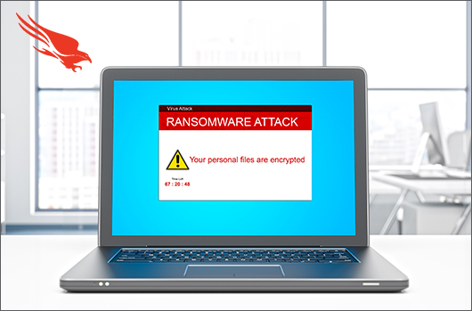 laptop with ransomware attack message